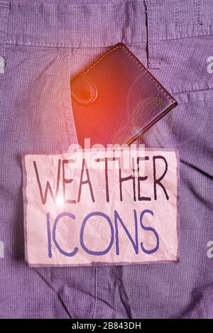 Handwriting text writing Weather Icons. Conceptual photo Plotted on a synoptic chart used for weather forecasting Small little wallet inside man trous Stock Photo