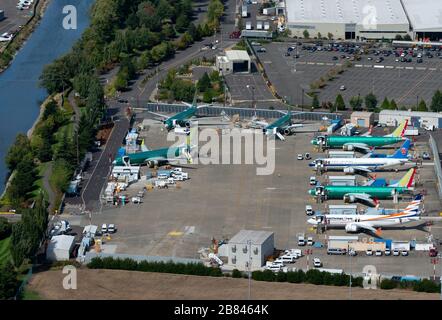 Multiple Boeing 737 (NG and MAX) parked in Renton Airport waiting for flight tests, painting and delivery. Boeing Factory, in WA, USA. Stock Photo