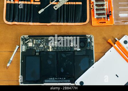 laptop motherboard. repairing broken laptop notebook computer. Electronic repair shop, technology renovation Stock Photo