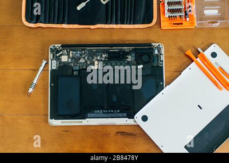 laptop motherboard. repairing broken laptop notebook computer. Electronic repair shop, technology renovation Stock Photo