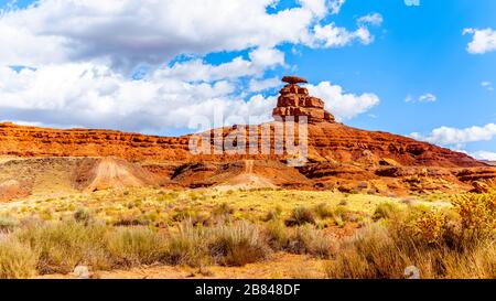 The sombrero-shaped rock outcropping on the northeast edge of the town named Mexican Hat, Utah, USA Stock Photo