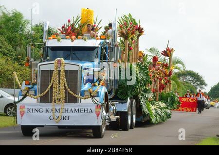 Lihue, Kauai, Hawaii / USA - June 9, 2018: The King Kamehameha Parade Court is shown on a decorated semi truck flatbed trailer during the annual event. Stock Photo