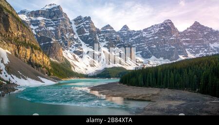 Sunset at moraine lake during late winter with colourful gradient of the sky Stock Photo