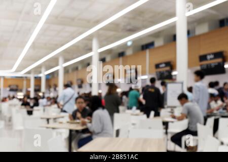 Blur image Canteen Dining Hall Room, A lot of people are eating food in University canteen blur background, Blurred background cafe or cafeteria Stock Photo