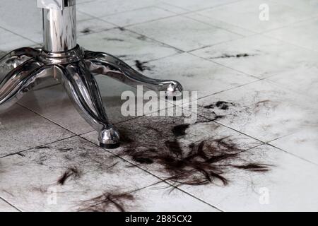 The hair on the floor in the barber shop, Barbers, Haircut clipping Hair Scrap, Pile of hair dirty Stock Photo