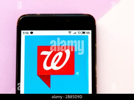 In this photo illustration Facebook logo is seen displayed on a smartphone Stock Photo