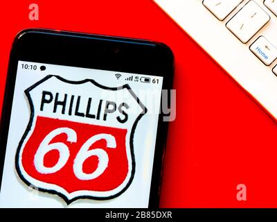 In this photo illustration Phillips 66 logo is seen displayed on a smartphone Stock Photo