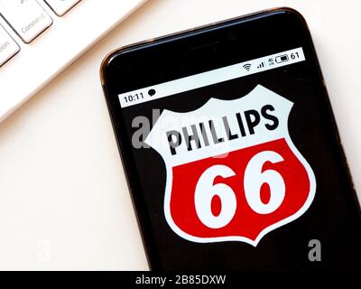 In this photo illustration Phillips 66 logo is seen displayed on a smartphone Stock Photo