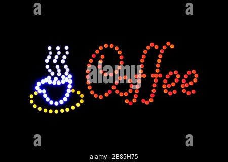 Coffee shop sign LED Bokeh light on dark background, Coffee shop sign Light signage bokeh dot colorful, Sign word coffee cup neon dot light symbol on Stock Photo