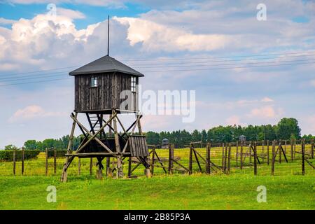 Lublin, Lubelskie / Poland - 2019/08/17: Guards towers and barbed-wire fences of Majdanek KL Lublin Nazis concentration and extermination camp Stock Photo