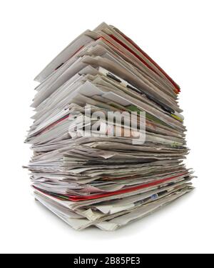 Newspapers stack isolated on white background, inclusive clipping path without shade. Germany Stock Photo