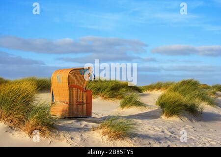 Beach scene with beach chair on the island 'Amrum', Northern Germany. Stock Photo