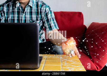 The innovation concept is due to continuous technology development. In response to commercial, Businessmen are using laptops in their hands. Stock Photo