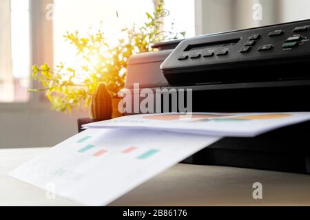 The printer is fully functional,Located on the desk. Is important in the office to present the work and success of the work. Stock Photo