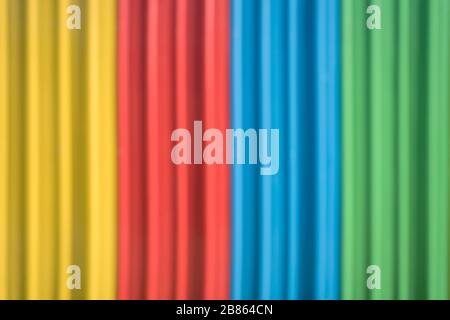 Blur abstract background vertical stripes, shiny, elegant look Mom, yellow, blue, red, green. Stock Photo