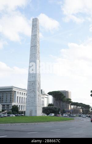 Rationalism architecture Obelisk in Giuglielmo Marconi Square, in EUR modern district from the fascist era, Rome Stock Photo