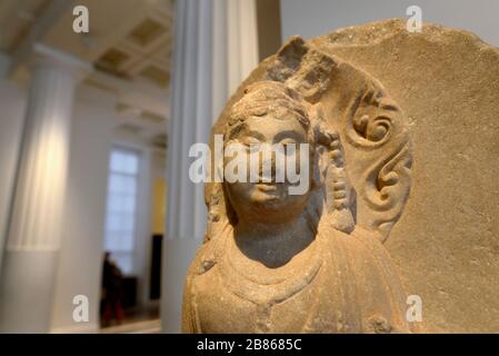 British Museum, Bloomsbury, London, England, UK. Stone head of Bodhidattva Manjushri - Buddhist embodiment of wisdom. 1100-1200AD, Baoding, Hebei.