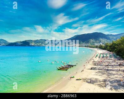 Aerial View With Drone. Tourists at Patong beach in Phuket Island, Thailand. Beautiful landscape Hat Patong Beach. Stock Photo