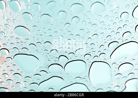 Blue sky with raindrops on the glass Stock Photo