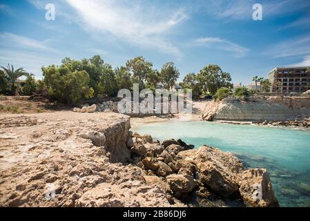 Picturesque Coast of Mediterranean Sea. Scenic Beach on Cyprus Island. Protaras. Panorama of the Republic of Cyprus. Turquoise Water. Stock Photo