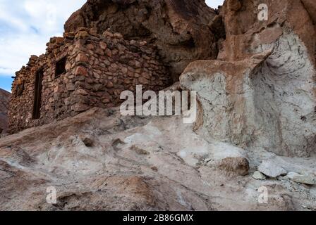 Abandoned houses built in the rock on the Calico Ghost town Stock Photo