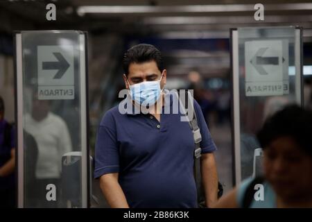 Mexico City, Mexico. 19th Mar, 2020. A passenger wearing a face mask is seen at a subway station in Mexico City, Mexico, March 19, 2020. Credit: Francisco Canedo/Xinhua/Alamy Live News Stock Photo