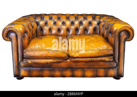 Vintage brown leather Chesterfield sofa isolated on a white background Stock Photo