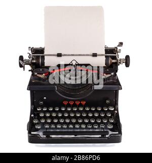 Old Dutch type writer with paper sheet isolated on white Stock Photo