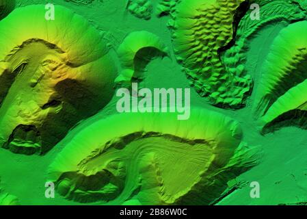 DEM - digital elevation model. Product made after proccesing pictures taken from a drone. It shows excavation site with piles of aggregates Stock Photo