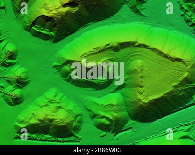 DEM - digital elevation model. Product made after proccesing pictures taken from a drone. It shows excavation site with piles of aggregates Stock Photo