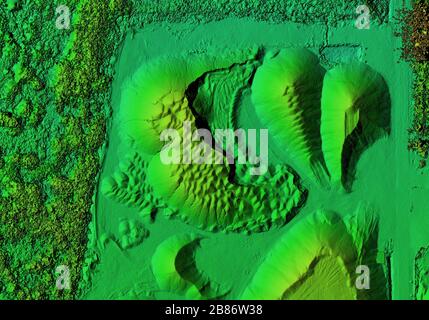 DEM - digital elevation model. Product made after proccesing pictures taken from a drone. It shows excavation site with piles of aggregates Stock Photo