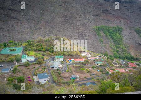 Part of the town of Jamestown on the remote island of St Helena. The green roofed buildings are used by the French Government for the maintenance of N Stock Photo