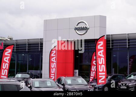 Bordeaux , Aquitaine / France - 10 14 2019 : Nissan dealership sign in front of showroom store Japanese brand Stock Photo
