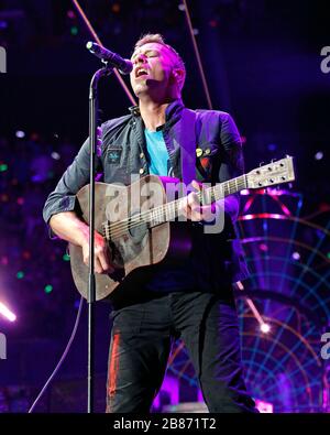 Coldplay frontman Chris Martin performs with the rest of the band at the American Airlines Arena in Miami, Florida. Stock Photo