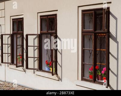 Ancient house with window-sills and flower pots Stock Photo - Alamy