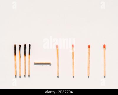 Social distancing concept showing how it can stop spreading of corona virus pandemic. Game stone concept illustrating epidemic safety. Keep the distan Stock Photo
