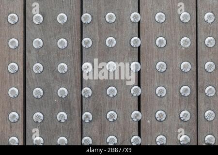 The texture of the floorboards with iron rivets Stock Photo