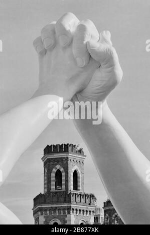 Sculpture of hands at venice arsenal Stock Photo