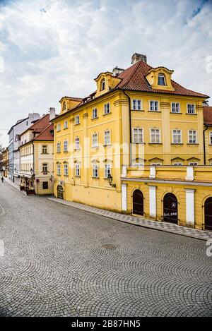 Prague, Czech republic - March 19, 2020. Street Na Kampe by Charles Bridge without tourists during coronavirus travel ban Stock Photo