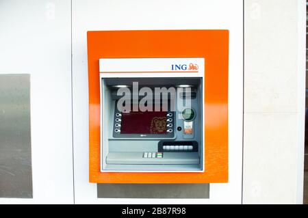 Elst, Netherlands - March 7, 2020: Dutch ING ATM, with orange ING logo Stock Photo