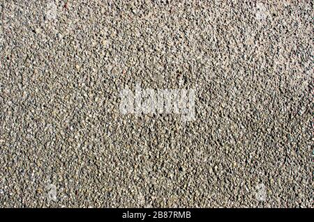 Black asphalt with gravel texture background Stock Photo