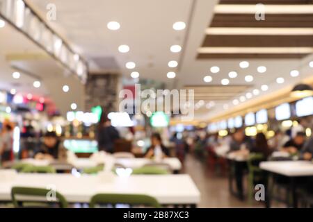 Blur image Canteen Dining Hall Room, A lot of people are eating food in University canteen blur background, Blurred background cafe or cafeteria Stock Photo