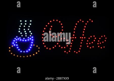 Coffee shop sign LED Bokeh light on dark background, Coffee shop sign Light signage bokeh dot colorful, Sign word coffee cup neon dot light symbol on Stock Photo