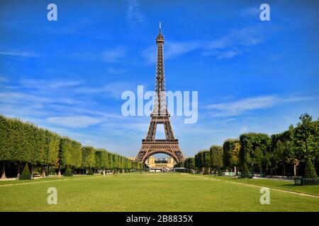 Eiffel Tower, iconic Paris landmark with vibrant blue sky, France Stock Photo