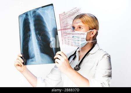 Digital Composing, Doctor looking at X-ray image in augmented reality, Austria Stock Photo