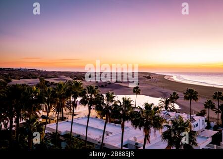 Sand dunes beach of Maspalomas Gran Canaria during sunrise Stock Photo