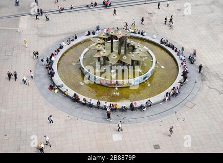 BERLIN, GERMANY 05-17-2019 A aerial view of the Alexanderplatz square, with the Brunnen der Volkerfreundschaft fountain in the center Stock Photo