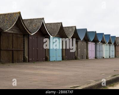 Beach huts along the promenade between Mablethorpe and Sandilands, Lincolnshire, UK Stock Photo