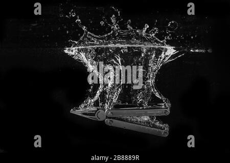 Leatherman Multitool Dropped in Water Stock Photo