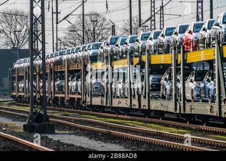 VW factory, Emden, new cars, car transporter, car train, freight train, with VW vehicles, Lower Saxony, Germany,